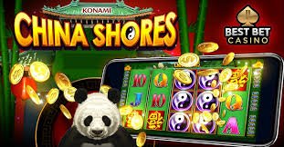Simbol Fortune Ox dan gulungan permainan di aplikasi mobile cempaka bet dengan tema emas dan zodiak Asia